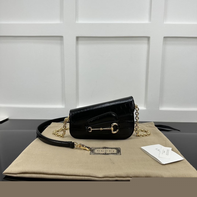 G*u*i top handle bags